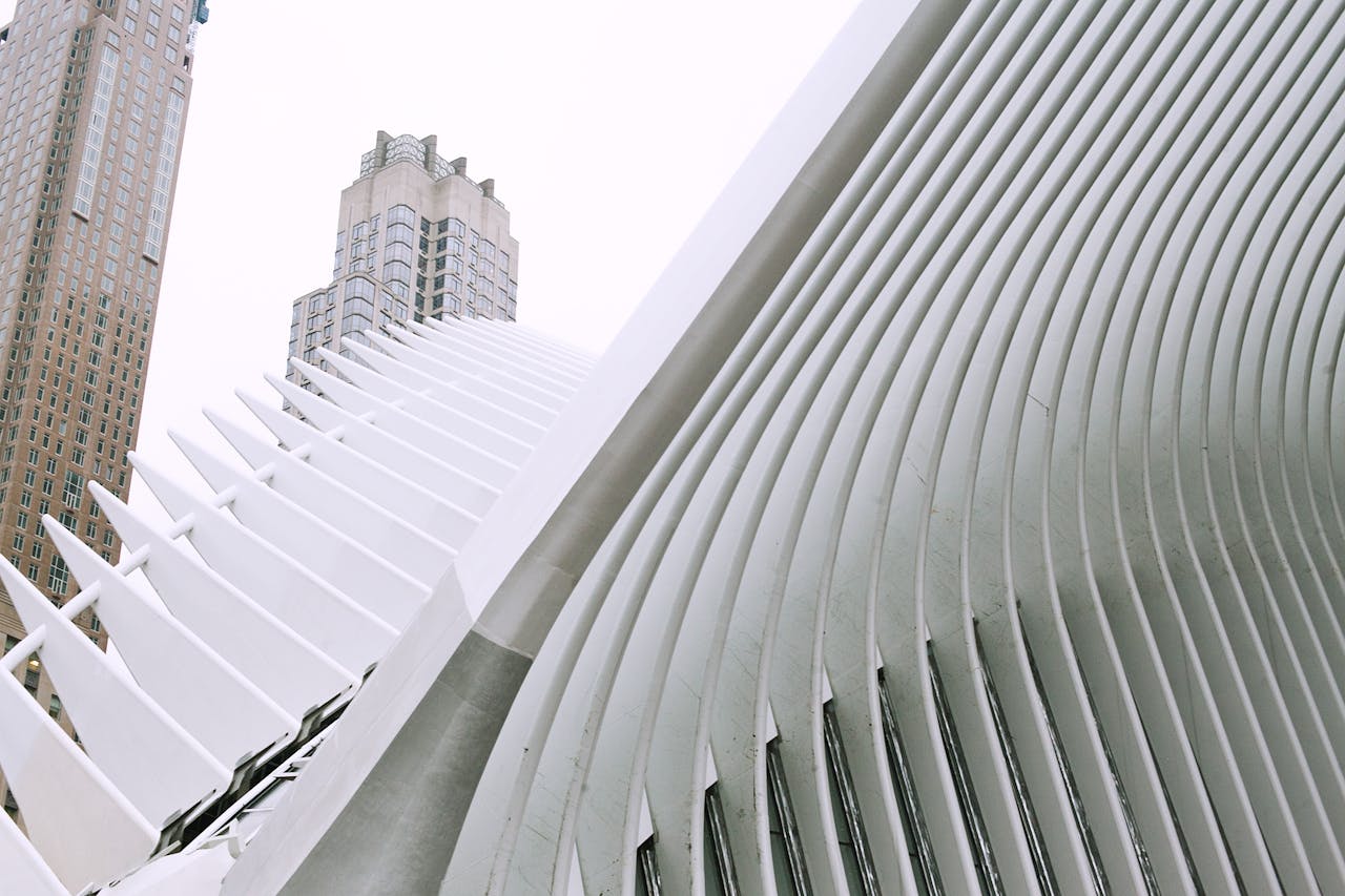 From below of contemporary construction of Oculus transportation hub located in downtown of NYC